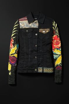 a black jacket with colorful flowers on it