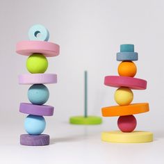 colorful wooden toys stacked on top of each other