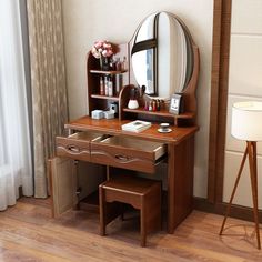 a wooden desk with a mirror and stool