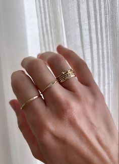 This 14k Ridge Ring is a unique addition to any jewelry box. Carefully carved ridges create a subtle bamboo effect. 14k Solid Gold Width is approximately 1.2mm Each ridge is hand filed into the ring, placement of each may vary slightly Half sizes are available. Simply leave a note with your size during checkout *14k Gold rings are made to order. Please allow an extra 3-4 business days for production.* Delicate Hammered Ring Jewelry, Delicate Hammered Jewelry Ring, Minimalist Stackable Rings With Diamond Cut Open Band, Minimalist Diamond Cut Open Band Stackable Rings, 14k Gold Diamond Cut Stackable Open Band Rings, Minimalist Rings With Diamond Cut On Round Band, Minimalist Diamond Cut Round Band Ring, Minimalist Diamond Cut Ring With Round Band, Minimalist Diamond Cut Round Rings