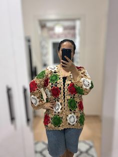 🎄 Stylish Cardigan That Carries The Christmas Spirit! 🌸 Wouldn't you like to stay warm and not compromise your elegance on cold winter days? Then this woman's cardigan designed with floral Christmas colors is for you! This cardigan, which attracts attention with its red, green and white colors that reflect the joy and spirit of Christmas, keeps you warm thanks to its soft texture and adds elegance to your elegance with its floral patterns. This cardigan, which you can easily use in your daily Handmade Long Sleeve Crochet Top, Long Sleeve Crochet Lace Sweater For Winter, Handmade Long Sleeve Crochet Top For Winter, Crochet Womens Cardigan, Crochet Daisy Cardigan, Granny Square Flowers, Cardigan Granny Square, Daisy Cardigan, Jacket Crochet