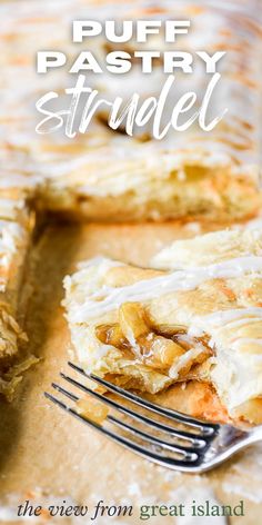 a piece of pastry sitting on top of a table next to a fork