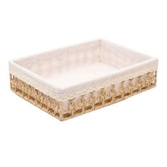 a white tray with lace trimming on the edges and bottom, in front of a white background