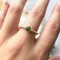 This beautifully simple ring is lovingly handmade with a Jade gemstone and a choice of 14k Gold Filled, 14k Rose Gold Filled or Sterling Silver band. M A T E R I A L S: * Dark Green Jade * 14k Gold Filled, 14k Rose Gold Filled or Sterling Silver S I Z E: * Gemstone - Approximately 4mm All of our jewellery is carefully handmade using good quality materials and handpicked gemstones, with the aim to produce quality pieces that you can love & wear for years to come. J A D E: * Talisman for Aries, Ta Green Gemstone Ring, White Jewelry Box, Wire Wrapped Ring, Sterling Silver Wire Wrap, Ring Simple, Jade Ring, Wire Wrapped Rings, White Jewelry, Crystal Ring