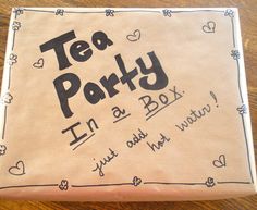 a piece of paper with the words tea party written on it