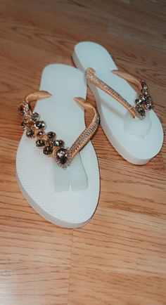 These Beautiful Satin Bridal Flip Flops with rhinestone are the perfect gift for a Wedding. These Flip Flops are hand wrapped in satin ribbon and embroidered with small rhinestone. These are available in ladies sizes 6,7,8,9,10 White Flat flip flops (pictured) . When ordering this item, please specify the size in the notes box I can do your flip flops in your wedding colors. Awesome for beach/ Summer weddings and as bridal party, flower girl & Mom gifts!! Made to Order: Orders are processed and Gold Embellished Bridal Accessories For Wedding, Gold Embellished Bridal Accessories For Party, Gold Beaded Bridal Accessories For Formal Occasions, Elegant Bedazzled Bridal Accessories For Party, Gold Adjustable Bridal Accessories, Bridal Flip Flops, Diy Shoe, Crafting Inspiration, Union City