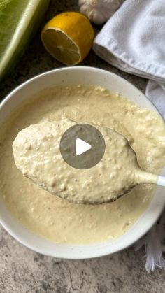 a bowl of soup with a spoon in it