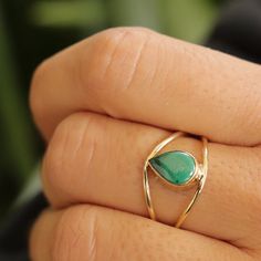 "Malachite Brass Ring/ Malachite Golden Ring/ Malachite Rings Brass/ Golden Malachite Rings/ Women Brass Rings/ Green Stone Brass Ring This golden ring is made of brass material and has a tear drop Malachite stone. All the stones of my shop are natural so each one is particular and unique. In this case the stone is green and it can have some darker green waves.  Malachite is the essence of joy and is known as the \"stone of transformation\" because it helps reveal and heal emotional pain by absorbing the pain into itself. It is especially helpful in bringing ease during times of change and gives the insight needed for personal growth. The brass I use is nickel free to prevent any kind of skin allergies. This material can go under water. After a while it loses a little bit of shyness but yo Green Teardrop Rings For Gift, Teardrop Gemstone Ring For May Birthstone, Adjustable Green Teardrop Ring, Green Opal Ring Spiritual Style, Green Opal Spiritual Ring, Green Teardrop-shaped Promise Ring, Green Teardrop Ring For May Birthstone, Green Teardrop May Birthstone Ring, Teardrop Green May Birthstone Ring