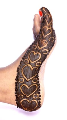 the foot is decorated with intricate designs