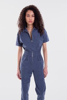 The utility-inspired jumpsuit just gained an extra flattering cut with a slim, fitted silhouette with slight stretch that hugs the body with a large defined elastic waist, front-patch pockets, front zip-through bodice. Miami is a one-and-done casual essential. Machine wash cold gentle cycle, dark colors separately, do not bleach. Our model is 5"9 and is wearing a size small Poplin 100% Cotton MADE IN LOS ANGELES Blue Utility Jumpsuits And Rompers For Work, Blue Jumpsuits And Rompers With Side Pockets For Work, Blue Workwear Jumpsuits And Rompers With Side Pockets, Blue Workwear Jumpsuit With Side Pockets, Blue Jumpsuit, Cotton Jumpsuit, Blue Jumpsuits, Perfect Wardrobe, Sea Blue