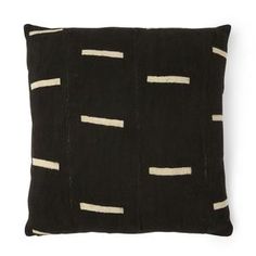 a black pillow with white lines on it