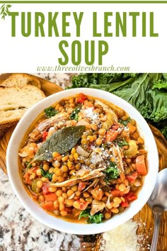 a bowl of turkey lentil soup with spinach and parmesan bread