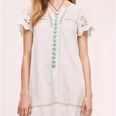 Nwt$178 Anthropologie Floral Embroidered Shift Dress White/Tan, Size 4, Small. Fully Lined, Pullover. 17.5” From Armpit To Armpit 36” Hip 35” Long Absolutely More Beautiful In Person. White Bohemian Dress With Cutwork Hem, Casual Knee-length Dress With Cutwork Hem, Casual White Dress With Cutwork Hem, Beige V-neck Embroidered Dress, Casual Dresses With Cutwork Hem, Horses White, Horse Dress, Dress White, Cream White