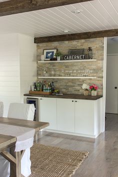 the kitchen is clean and ready to be used as a dining room or living room