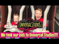 two young boys riding on top of a roller coaster with the words universal studios hollywood