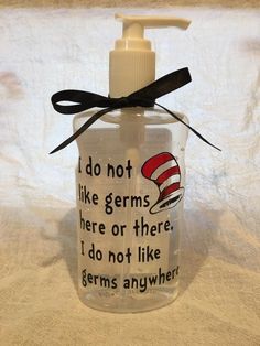 a hand sanitizer with a dr seuss hat on it that says, i do not like germs here or there