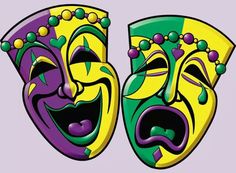 two colorful masks with faces painted on them