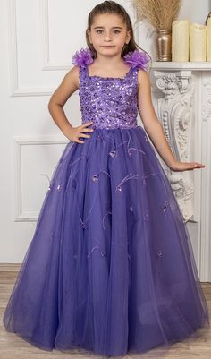 The bottom of our dress has sequin bead printed tulle on satin. Flower detail is applied on the sleeves. The bottom lining is made of cotton fabric, does not cause sweating or burning, and is suitable for children's body sensitivity. Available in Cream, Purple, Saks, Grey, Red and Powder colors. Make your celebration even more beautiful with the exquisite evening wedding dress designed to make you feel special and like a princess. Step into the world of dreams with our Nossiby Purple Dress. The sequin tulle and delicate embellishments in this inspiring costume dress add elegance to unforgettable special memories. Discover the magic of childhood dreams in every stitch of our collections. Whether it's a wedding, evening gown or a day filled with special occasion fun, our collection of Purple Purple Sequin Ball Gown Dress, Purple Tulle Dresses With Sequins, Purple Embellished Dress For Pageant, Purple Embellished Pageant Dress, Purple Embellished Ball Gown Dresses, Purple Embellished Ball Gown, Embellished Purple Ball Gown Dress, Embellished Purple Ball Gown, Purple Embellished Tulle Gown