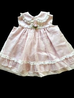 This is a beautiful vintage Pink polka-dot baby dress with pink frills, Bryan sz for 18 Mo. Four button closure on the back. This dress would be perfect for Easter, Church, or a picnic in the park. Anytime you want to show off your beautiful baby would be a time to wear this wonderful item. *email me if you need measurements. Pink Ruffled Dress For First Birthday, Summer Vintage Dress With Ruffles For Dress-up, Vintage Sleeveless Dress For Tea Party, Cute Ruffled Collar Dress For Dress-up Occasions, Cute Dress With Ruffled Collar For Dress-up, Cute Dress With Ruffled Collar For Dress-up Occasions, Cute Dress-up Dress With Ruffled Collar, Cute Dresses With Ruffle Hem And Ruffled Collar, Cute Polka Dot Dress With Ruffles