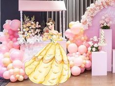 there is a princess standing in front of balloons