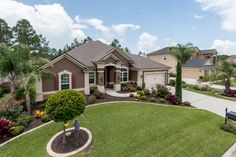 a house with landscaping in front of it