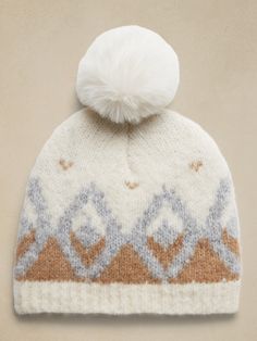 One of our coziest fabrications, this gorgeous Fair Isle beanie is made to brave the storm in luxurious bliss with an inherently soft alpaca hair blend.  Pom pom top.  Length: 9" (24cm) Alpaca Beanie, Fair Isle Beanie, Ski Hats, Fair Isle Knitting, Hat Band, Fair Isle, Light Gray, Alpaca, Brave