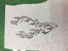 a piece of paper with an image of a bird flying through the air on it