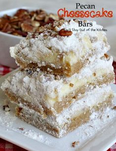 three pieces of pecan cheesecake bars stacked on top of each other