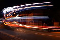 blurry photograph of city street at night