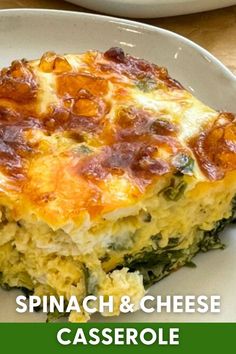 spinach and cheese casserole on a white plate with the words spinach and cheese casserole