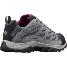 a woman's walking shoe with grey and purple accents