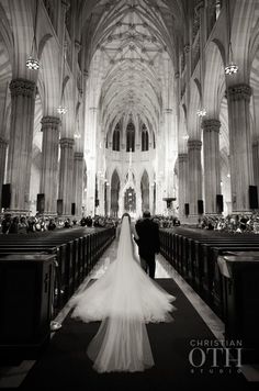 the bride and groom are walking down the aisle