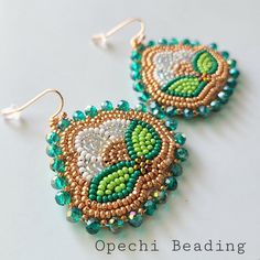 the beaded earrings are green and gold