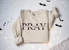 Religious Sweatshirt, Pray On It, Pray Over It, Pray Through It Shirt, Pray Sweatshirt, Faith Shirt, Jesus Sweater, Womens Christian Shirts Sizing and Color Information: Our shirts are made to order specially for you. For this reason, we don't accept returns or exchanges. To ensure the perfect fit, please refer to our color and size charts before placing your order. If you have any questions, don't hesitate to send us a message to clarify sizing or colors. HOW TO ORDER MULTIPLES: 1. Select your size and color in the drop down menus & add to cart! 2. Then simply go back and repeat for each shirt. If you want to add or change anything on the existing design that we show in the display picture, please contact with us. Product Information: (T-shirts and Long Sleeve T-shirts) Solid colors such Pray Sweatshirt, Jesus Sweater, Pray Through It, Womens Christian Shirts, Pray On It, It Shirt, Faith Shirt, Christian Shirts, Over It