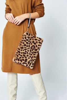 Elevate your outfit with this luxury faux fur clutch bag, featuring a side zipper and removable wrist strap.  With a wide variety of print patterns and colours available, there's a clutch for every outfit.  Luxury faux fur animal print clutch bag. Fur Clutch Bag, Fur Clutch, Fur Animal, Faux Fur Bag, Envelope Clutch Bag, Fur Bag, Printed Clutch, Tiger Print, Free Bag