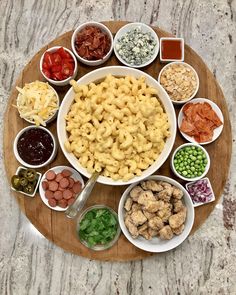 a wooden platter filled with different types of food