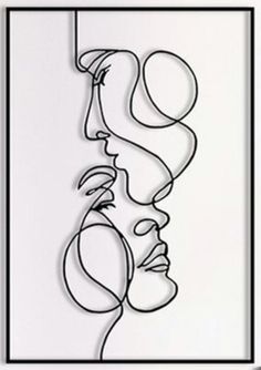 a line drawing of two faces with one face facing each other