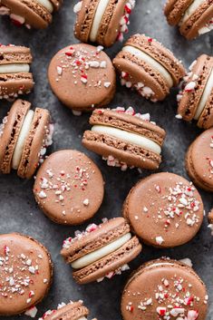 chocolate macaroons with white and red sprinkles