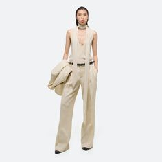 Classic trouser with double pleats at front in lightweight Italian linen suiting. Cut with a relaxed fit throughout. Tailored Full-length Pants With Welt Pockets, Linen High-waisted Pants With Welt Pockets, Linen Wide-leg Pants With Welt Pockets, Tailored Full-length Linen Pants, Fitted Wide-leg Pants With Seam Detailing, Garment Manufacturing, Classic Trousers, Denim T Shirt, Denim Outerwear