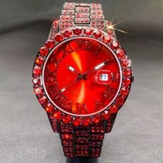 This Deep Fire Red, Fully Covered Iced Out Simulated Diamond (Cz) Watch Is Very Impressive And Designed For Men Who Want To Stand Out From The Rest. This Watch Is Fully Embellished With High-Quality, Iced Out Simulated Diamonds (Cz) That Pick Up The Light Like Real Diamonds Without The Hefty Price. Features: Round Dial Shape Red Face Analog Display Roman Numerals Is Not Water-Resistant Quartz Movement Stainless Steel Band Electronic Drive Mode Alloy Metal Case Deep Red Simulated Diamonds (Cz) Qu Red Watches With Diamond Hour Markers, Red Watches With Diamond Hour Markers As Gift, Elegant Red Diamond Watch For Gift, Formal Red Jewelry With Diamond Hour Markers, Luxury Watches For Men Most Expensive, Stone Rings For Men, American Gifts, Red Face, Diamond Bling