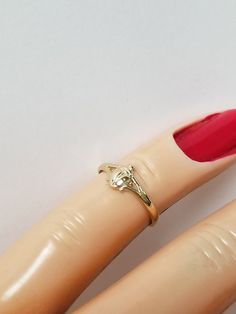 "Thanks for shopping our vintage estate store. We tend to sell well below wholesale and truly hope you enjoy all of our items. Many of the items are one of a kind, so please enjoy scrolling through the pictures and hopefully something will catch your eye. Brown spots are from camera or reflections. Estate 14k yellow gold beetle bug infant or baby ring. Custom made ring for our shop. Ring size: 1 Setting: 5mm 1/4\" Band width: 1.5mm Weight: .66 gram Marked 14k and it's sweet. One that you will lo Vintage Gold Birthstone Ring As Gift, Vintage Gold Birthstone Ring For Gift, Gold Vintage Birthstone Ring As Gift, Gold Vintage Birthstone Ring For Gift, Classic Gold Birthstone Ring As Collectible, Gold Beetle, Baby Ring, Baby Rings, Beetle Bug