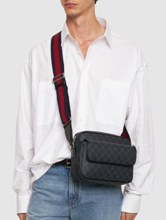 Find GUCCI Gg Crossbody Bag on Editorialist. Height: 18cm Width: 23cm Depth: 12cm. Black GG Supreme canvas . Black leather trim . Blue and red Web . Cotton linen lining . Inside: 1 zip pocket . Outside: 1 zip pocket . Adjustable canvas shoulder strap with 55cm drop; length: 94cm - 145cm . Zip closure Red Web, Gucci Men, Black Crossbody, Gucci Black, Black Cross Body Bag, Leather Trims, Cotton Linen, Zip Pockets, Crossbody Bag