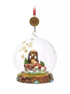 a glass ornament with a dog in it