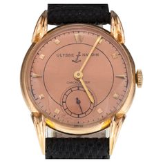 Ulysses Nardin 18k Rose Gold Chronometer Manual Wind Watch w/ Leather Band Movement #512842 Case #623658 18k Rose Gold Case w/ Fancy Lugs 28 mm in Diameter (30 mm w/ Crown) Lug-to-Lug Distance = 38 mm Lug-to-Lug Width = 15 mm Thickness = 9 mm Satin Copper Colored Dial w/ Black Writing, Gold Tic Marks and Hands (M + H) Includes Seconds Sub-Dial 26 mm in Diameter Black Leather Aftermarket Band w/ Gold-Plated Clasp Total Length = 8.75" Largest Wrist Fit = 7.75" Width at Case = 15 mm Width at Tip = Unique Watches, Black Writing, Ulysse Nardin, Rose Gold Case, Fashion Aesthetics, Watches Unique, Cute Animal Photos, Gold Case, Women Wrist Watch