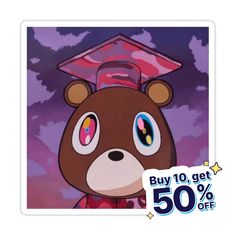 a sticker with an image of a bear wearing a graduation cap on it's head