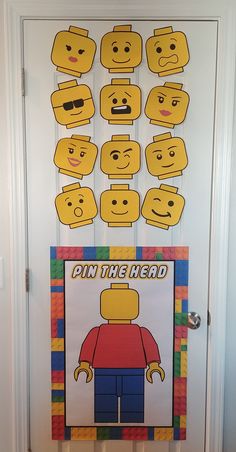 a door decorated with legos and the words pin the head on it's front