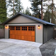 a garage is shown with two lights on the front and one in the back side