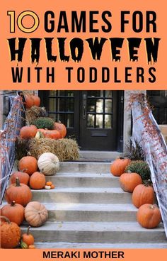 pumpkins and gourds are sitting on the steps in front of a house