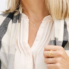 Understated and chic, the Nella Mini Initial Pendant lets you wear your initial or the initial of someone you love with a lowercase letter charm that can be worn on its own or layered with other pieces. Available in sterling silver, 18k gold plated or 18k rose gold plated silver Size: 1/4 to 1/2" (varies by letter) 16" cable chain with 2" extender Spring ring closure Made in the USA This is a lowercase only font, uppercase letters entered will be produced as lowercase This item is FINAL SALE and Classic Necklace For Personalized Gift, Rose Gold Charm Necklace With Initial Pendant, Elegant Initial Necklace With Charms As Gift, Elegant Sterling Silver Initial Necklace With Charms, Dainty Rose Gold Initial Necklace With Charms, Everyday Sterling Silver Initial Necklace, Sterling Silver Initial Necklace For Everyday, Chic Personalized Initial Pendant Necklace, Rose Gold Sterling Silver Initials Charm Necklace