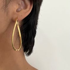 A curved, elongated frame add interest and an artistic vibe to these hoops. Stack them in your bottom hole with smaller hoops and studs up your lobe. - 18k yellow gold plated silver; sterling silver- 2.5" length- Post with omega closure Artistic Vibe, Gold Plated Silver, Gold Plated Sterling Silver, Pure Silver, Gold Vermeil, Anklets, Solid Gold, Silver Plate, Fine Jewelry